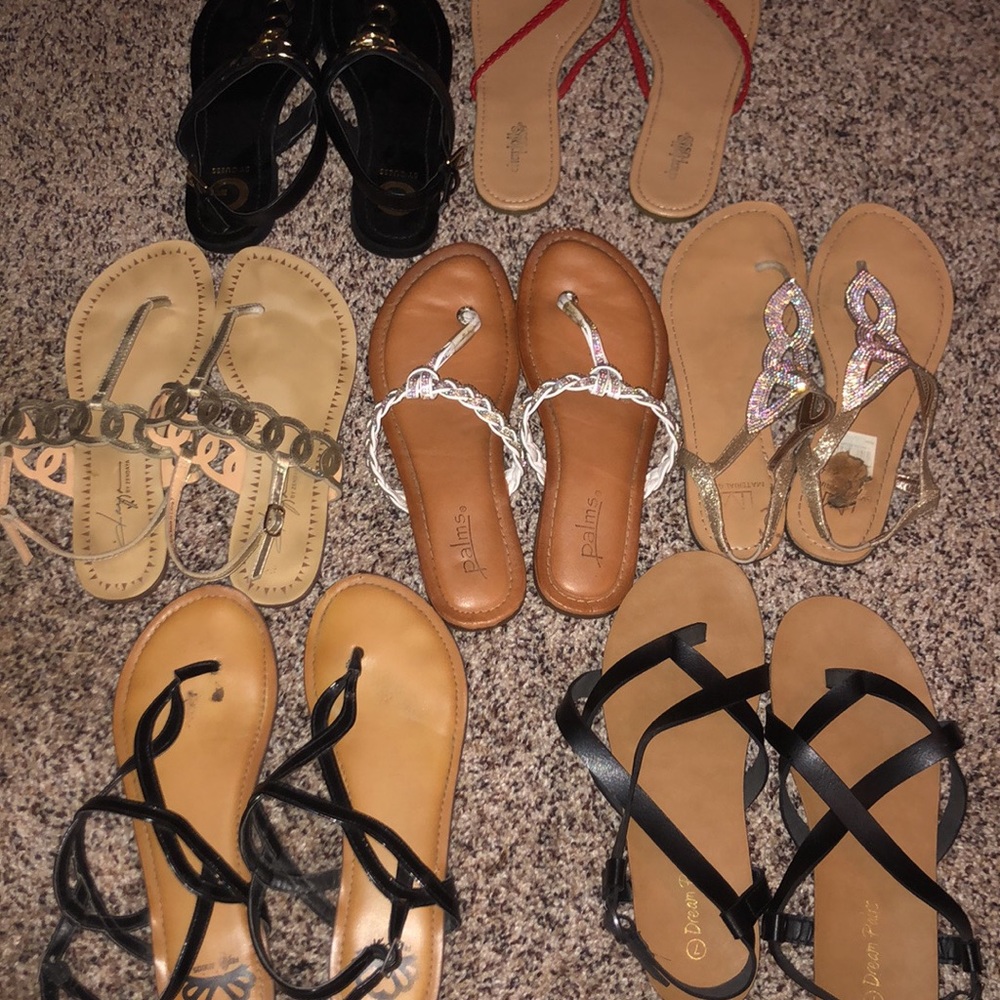 7 pair of size 7 sandals all hardly worn.